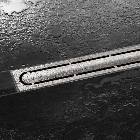 Pure design of Schluter KERDI LINE STYLE drain grate between floor tiles
