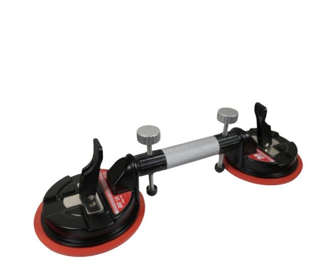 Double suction cup to bring slabs closer and aligned
