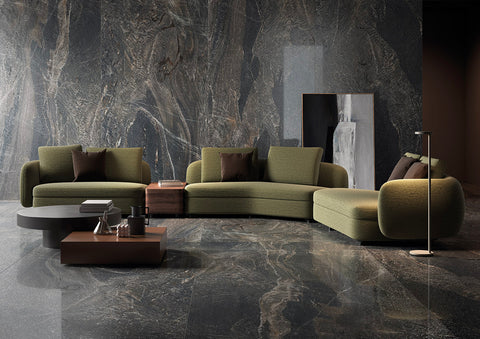 Iris Ceramica premium large format marble tiles in a modern lounge's floor and walls