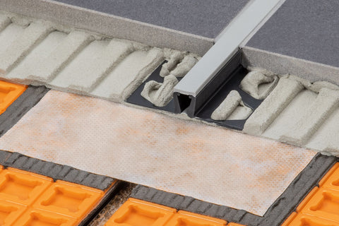 Schluter Dilex movement profile fitted between tiles