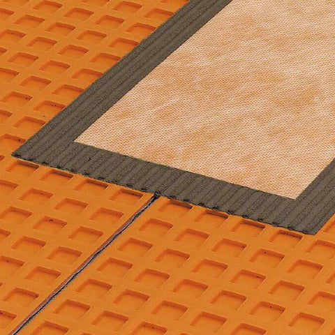 Schluter KERDI Keba Sealing Band placed over joint in membrane